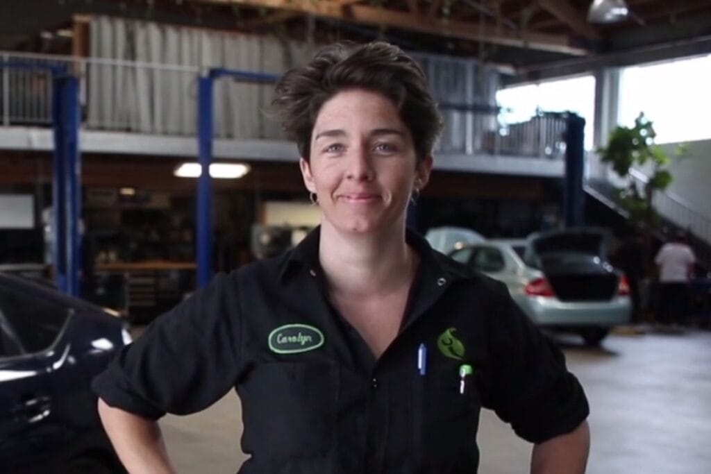 Image showcasing Carolyn Coquillette wearing shop shirt at Earthling Automotive, formerly Luscious Garage