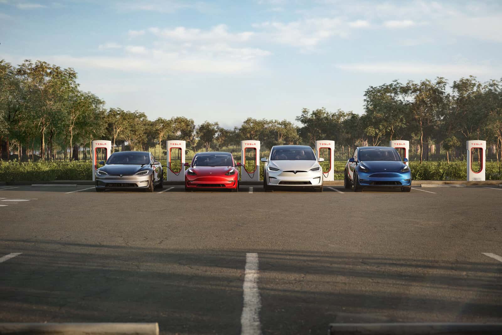 Image showcasing Tesla Model 3, S, X and Y parked and charging at a Tesla Supercharger