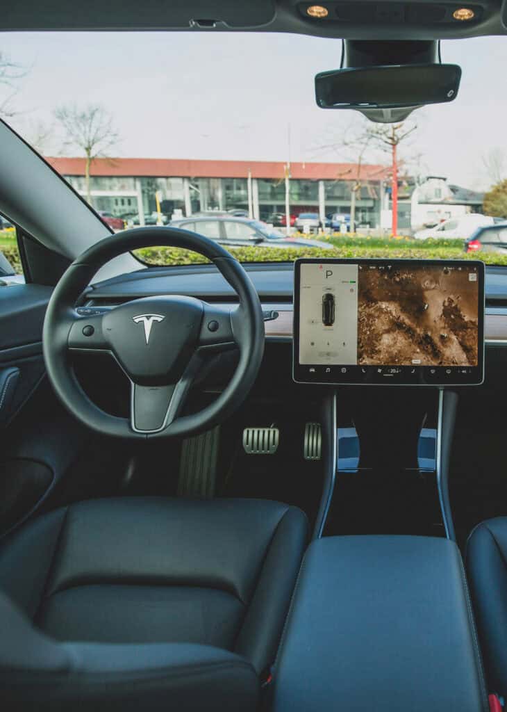 Tesla Parked with a Dashboard On