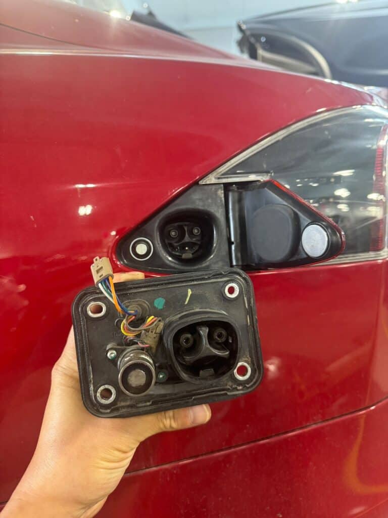 OEM Tesla Model S/X Charge Port Door Assembly – 1038548-10-I (2016-2020, Left Rear)
