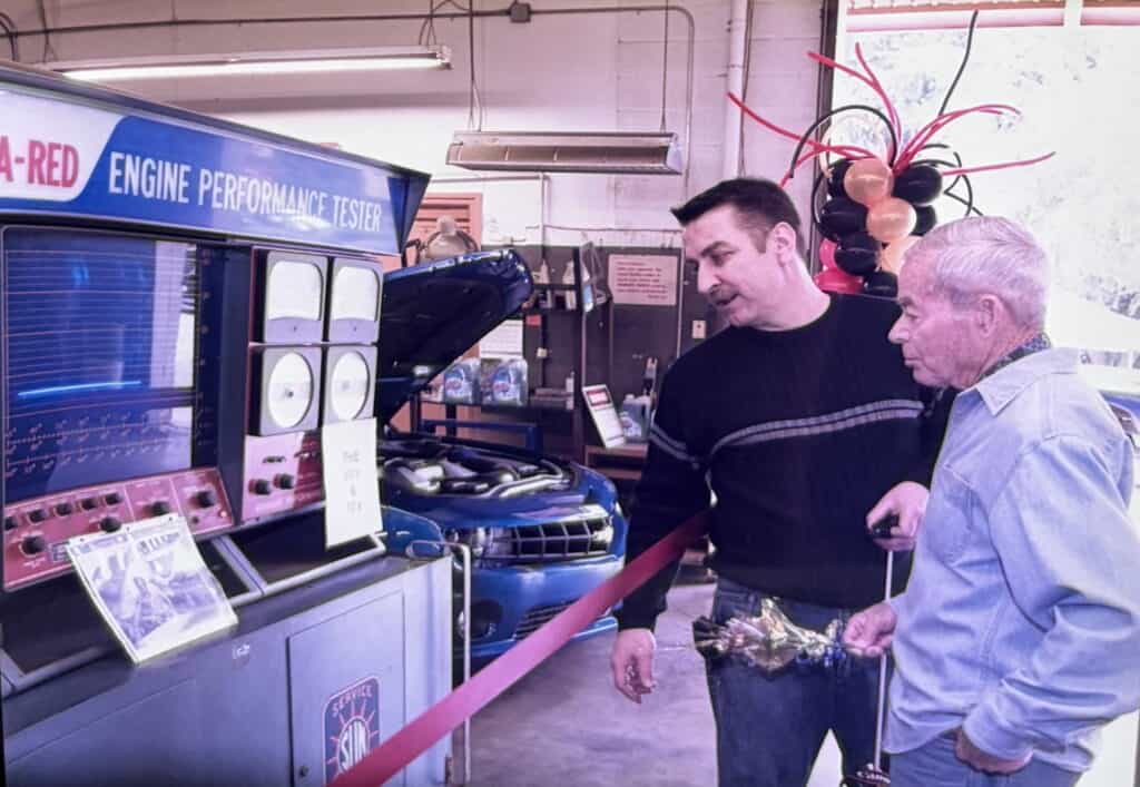 Scott with Connie, a decade after taking over the shop